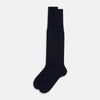 View 2 of product A single navy long sock by Turnbull & Asser, featuring a subtle ribbed texture and crafted from soft Egyptian cotton, displayed on a plain white background.