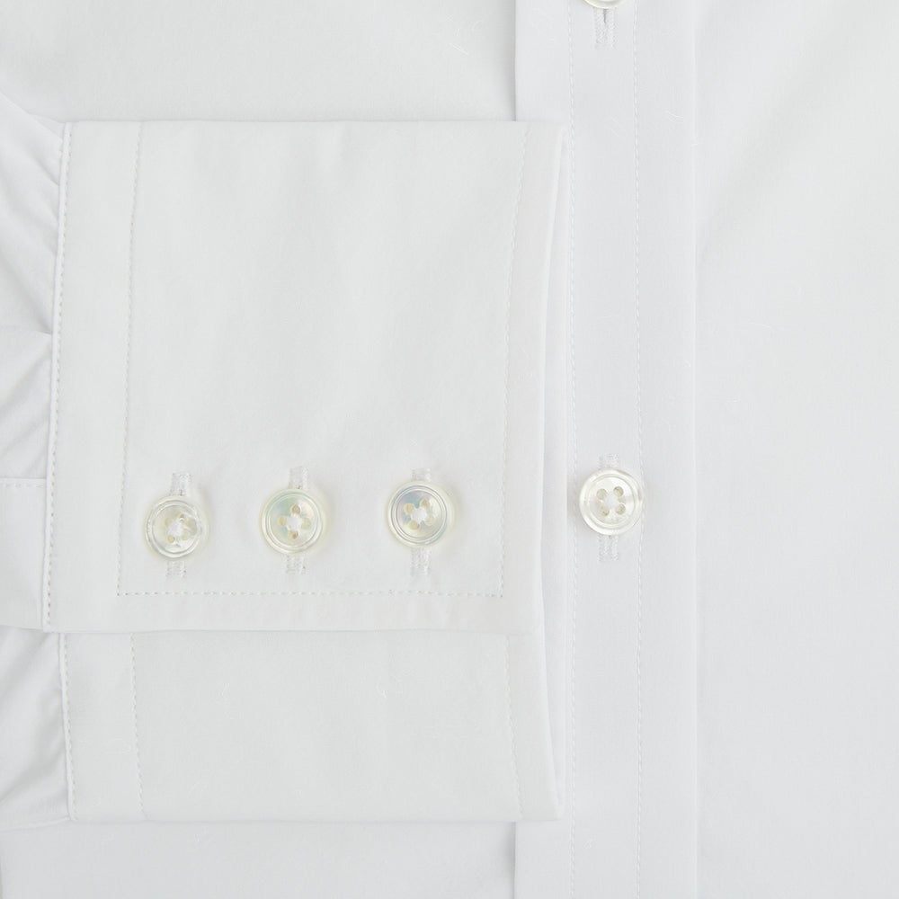 The White Mayfair Shirt by Turnbull & Asser features a classic collar, white buttons, and an inner branded label, all neatly crafted from premium sanforised cotton for lasting quality.