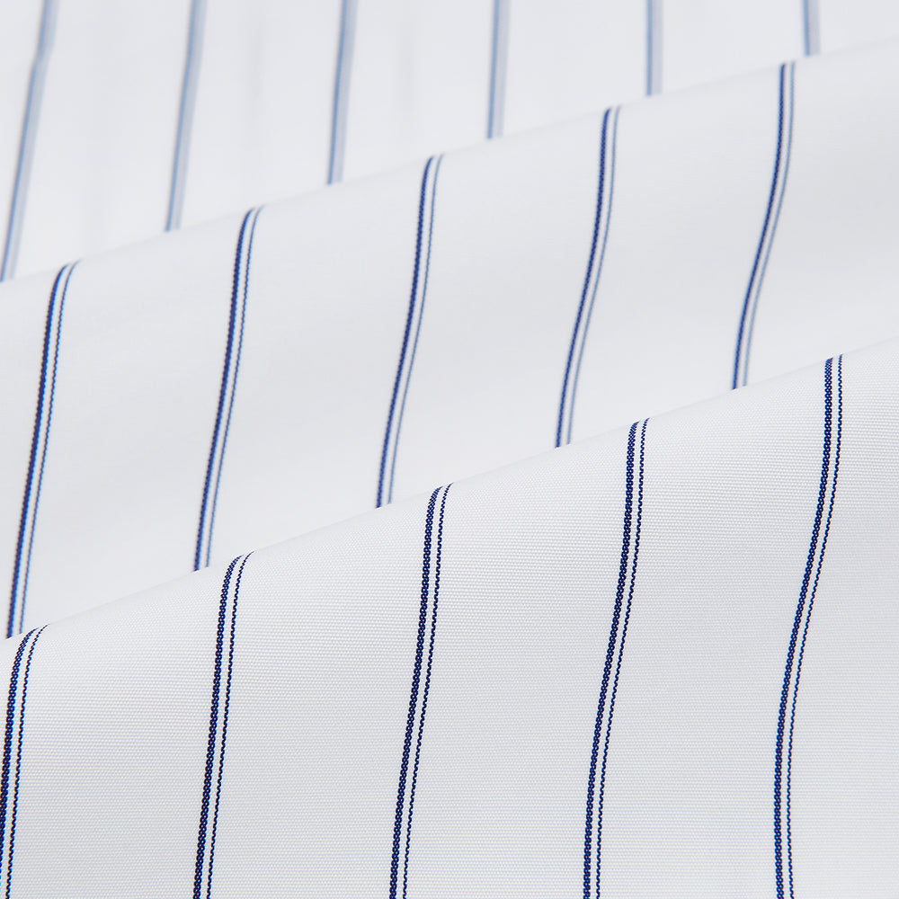 The Dark Navy Double-Pinstripe Westminster Shirt by Turnbull & Asser, featuring a Turnbull collar and cuffed sleeves, is displayed laid flat on a plain white background, highlighting its British craftsmanship.