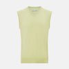 View 1 of product The Turnbull & Asser Melon Green V-neck Cashmere Vest features a ribbed hem and sleeveless design, ideal for a distinguished look. Presented against a plain white background.