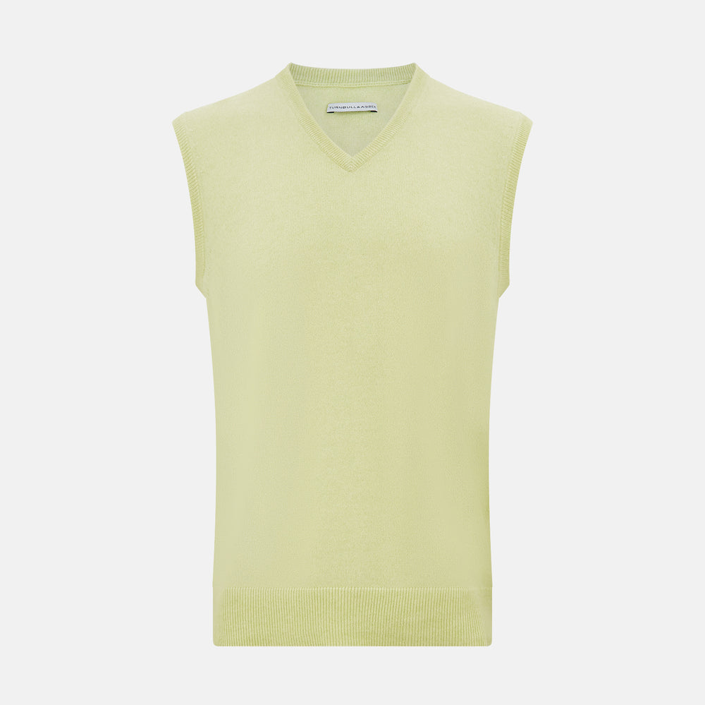 The Turnbull & Asser Melon Green V-neck Cashmere Vest features a ribbed hem and sleeveless design, ideal for a distinguished look. Presented against a plain white background.