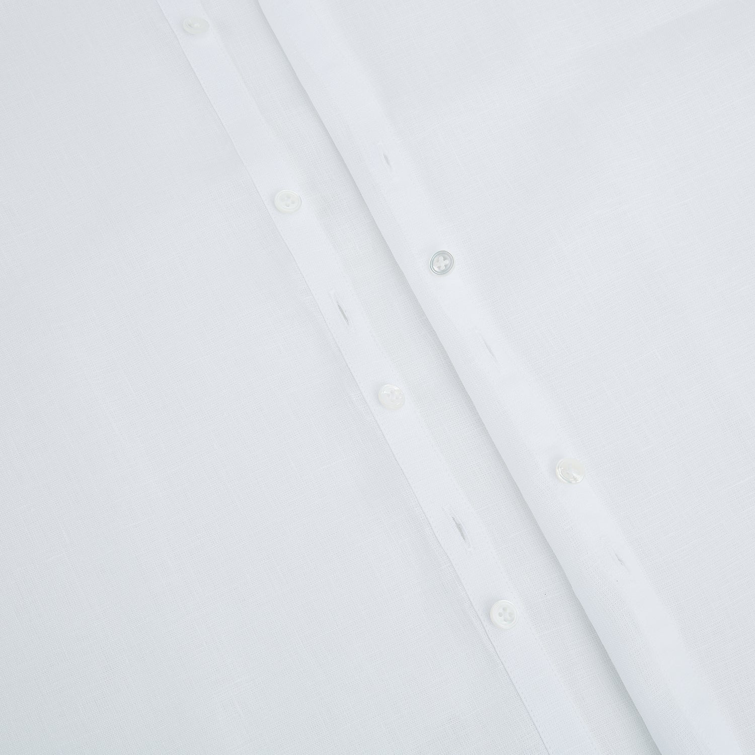 View 7 of product The White Linen Westminster Shirt by Turnbull & Asser features a classic Turnbull collar and button-down front, highlighting British craftsmanship against a plain white background.