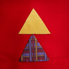 View 5 of product The Turnbull & Asser Red Applique Hand Stitched Lambswool Blanket features black-stitched edges and handsewn tie silk patches, including a yellow triangle and plaid triangle arranged to form a stylized fish.
