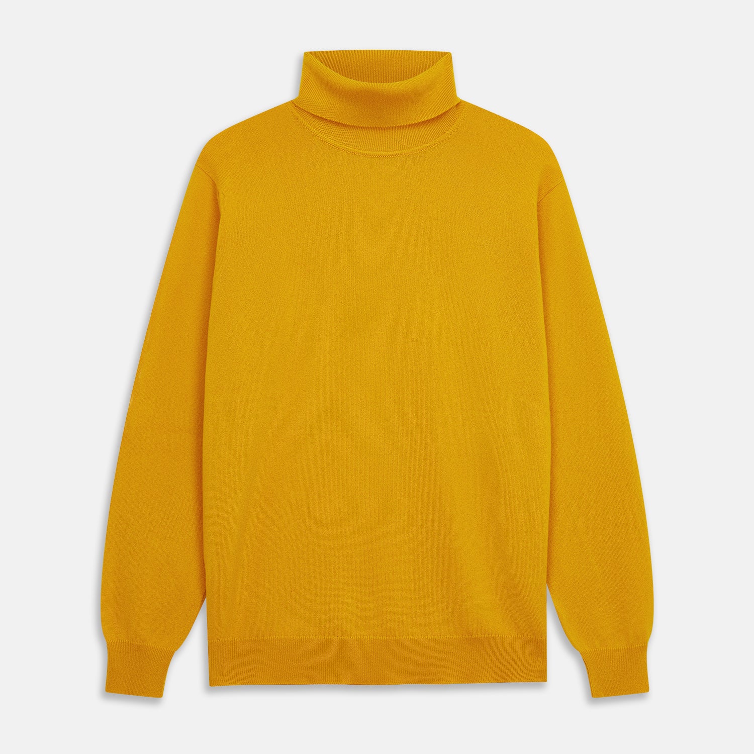 View 2 of product A man with short hair and a beard wears the Gold Aubrey Cashmere Roll Neck Jumper by Turnbull & Asser with dark pants, standing against a plain beige background and calmly looking at the camera, highlighting this stylish autumn sweater look.