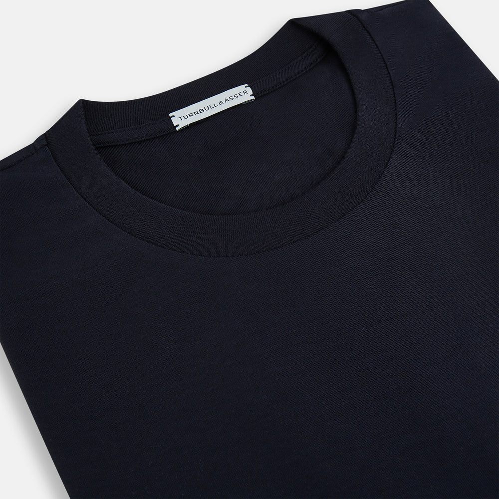 A versatile, high-quality navy short-sleeve t-shirt by Turnbull & Asser, featuring a classic crew neckline, laid flat on a white background.