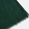 View 2 of product The Turnbull & Asser Forest Green Cashmere Scarf features a hand-dyed finish, soft texture, and lightly frayed edges, artfully tied in a loose knot and displayed on a white background—a true luxury accessory.
