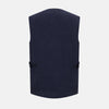 View 3 of product The Turnbull & Asser Navy Linen Twill Waistcoat is a sleeveless V-neck vest featuring two zippered side pockets and a chest pocket, shown on a plain white background.