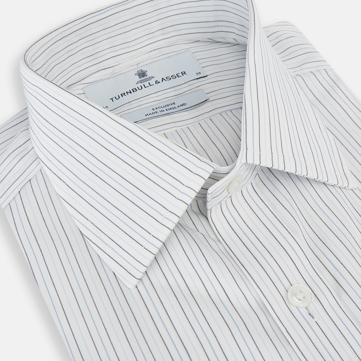 View 2 of product The Turnbull & Asser Blue Multi-Tone Double Pinstripe Mayfair Shirt, crafted from premium Italian cotton with a pointed collar, buttoned cuffs, and long sleeves, is shown on a plain white background.