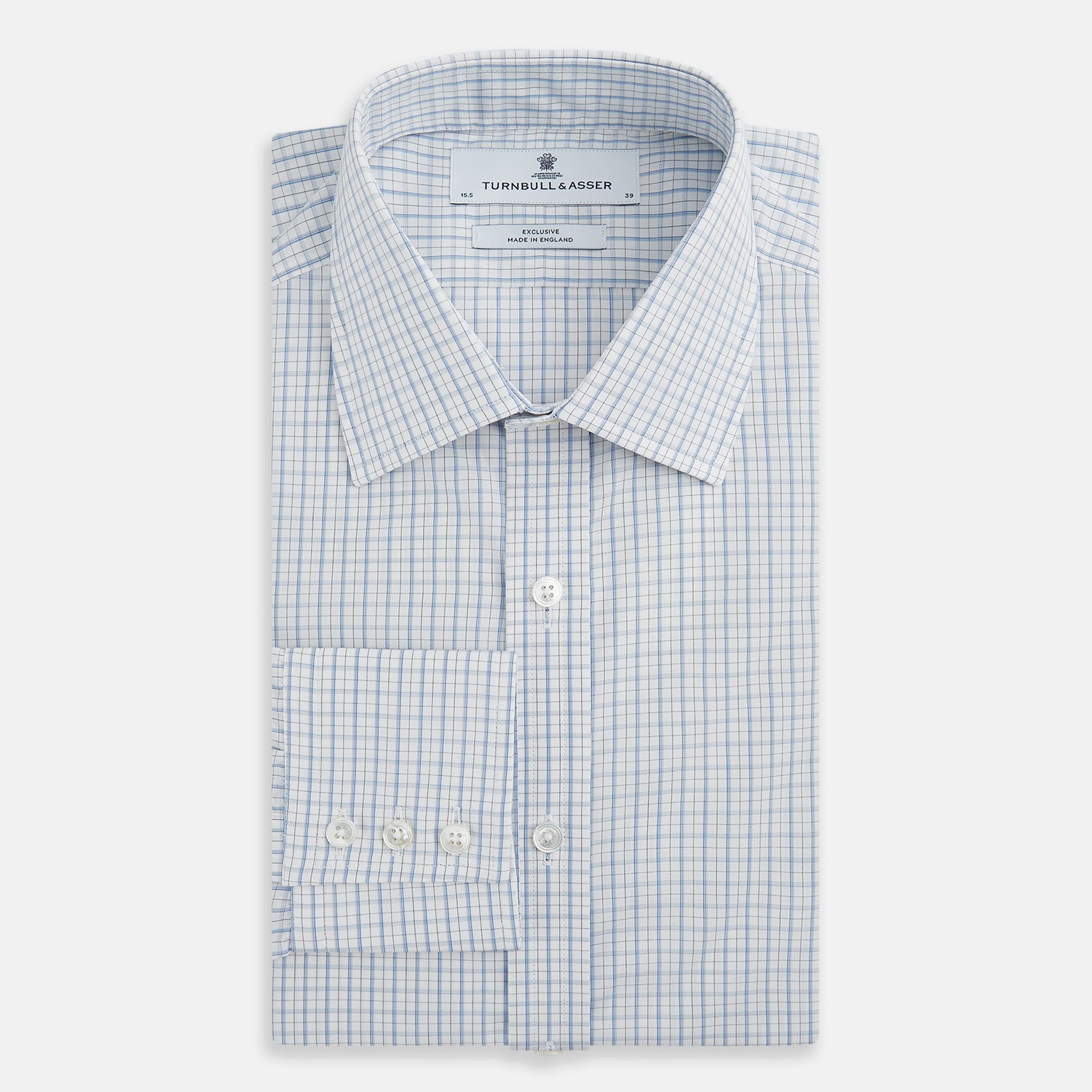 View 5 of product The Turnbull & Asser Sky Blue Combination Graph Check Mayfair Shirt features long sleeves, a pointed collar, buttoned cuffs, and a blue and white check pattern that showcases British craftsmanship. Displayed on a white background.