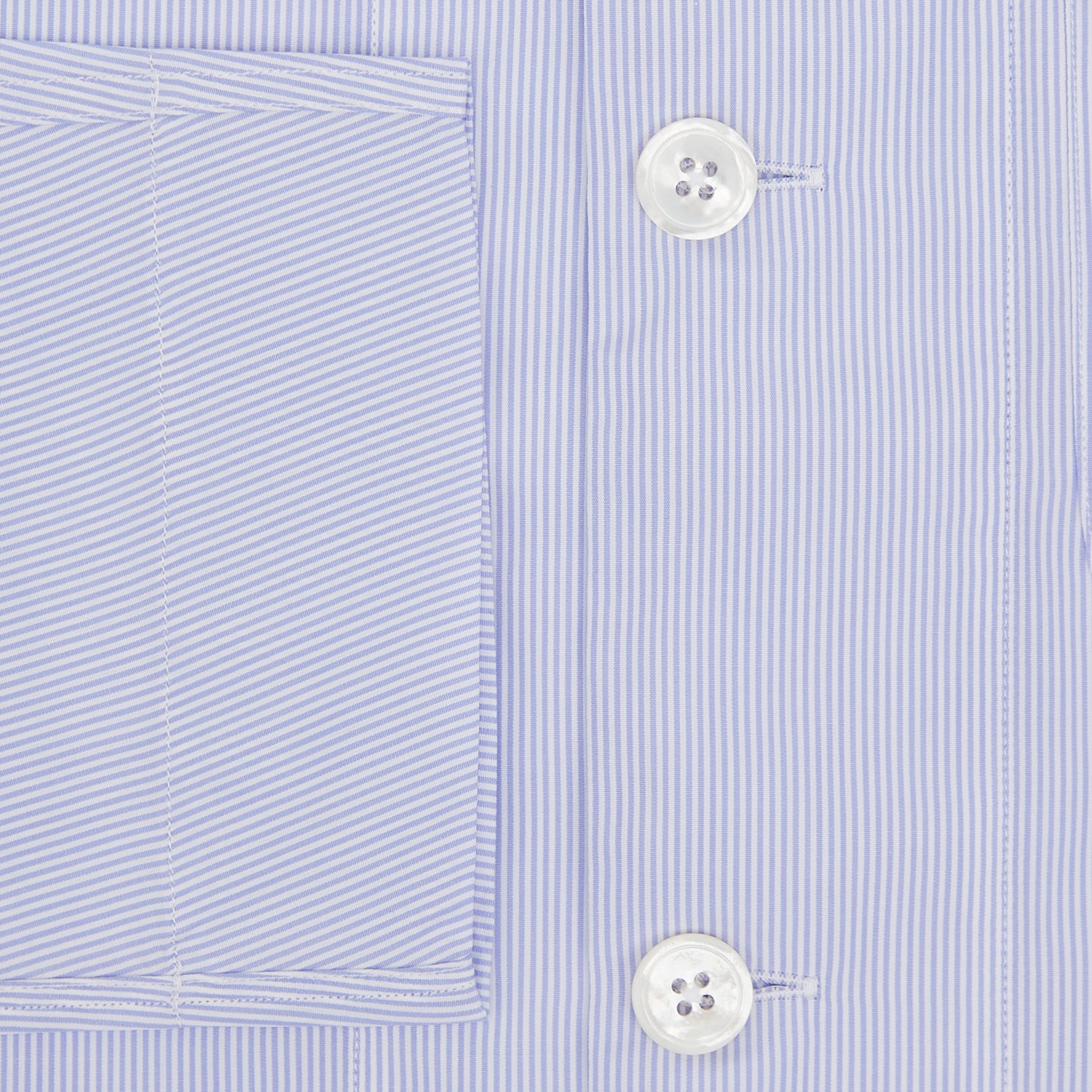 View 4 of product The Turnbull & Asser Pale Blue Hairline Stripe Pyjama Shirt features long sleeves and a single chest pocket, offering an elegant sleepwear style—shown on a plain white background.