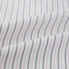 View 6 of product The Turnbull & Asser Midnight Blue and Red Ticking Stripe Mayfair Shirt features long sleeves, a pointed collar, buttoned cuffs, and fine Italian cotton—an essential men's wardrobe piece shown on a plain white background.