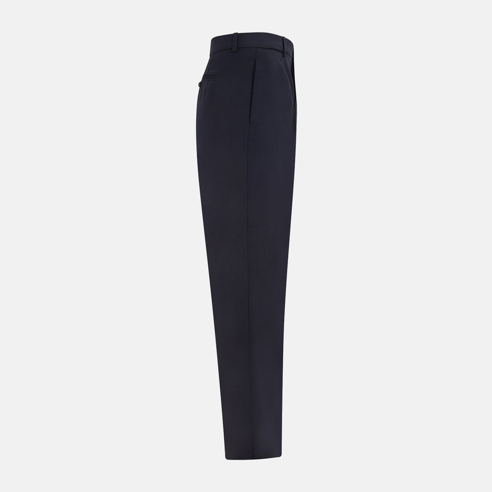 The Navy Rupert Trousers by Turnbull & Asser are tailored wool trousers with a button and zip closure, belt loops, and front creases, elegantly displayed against a plain white background.