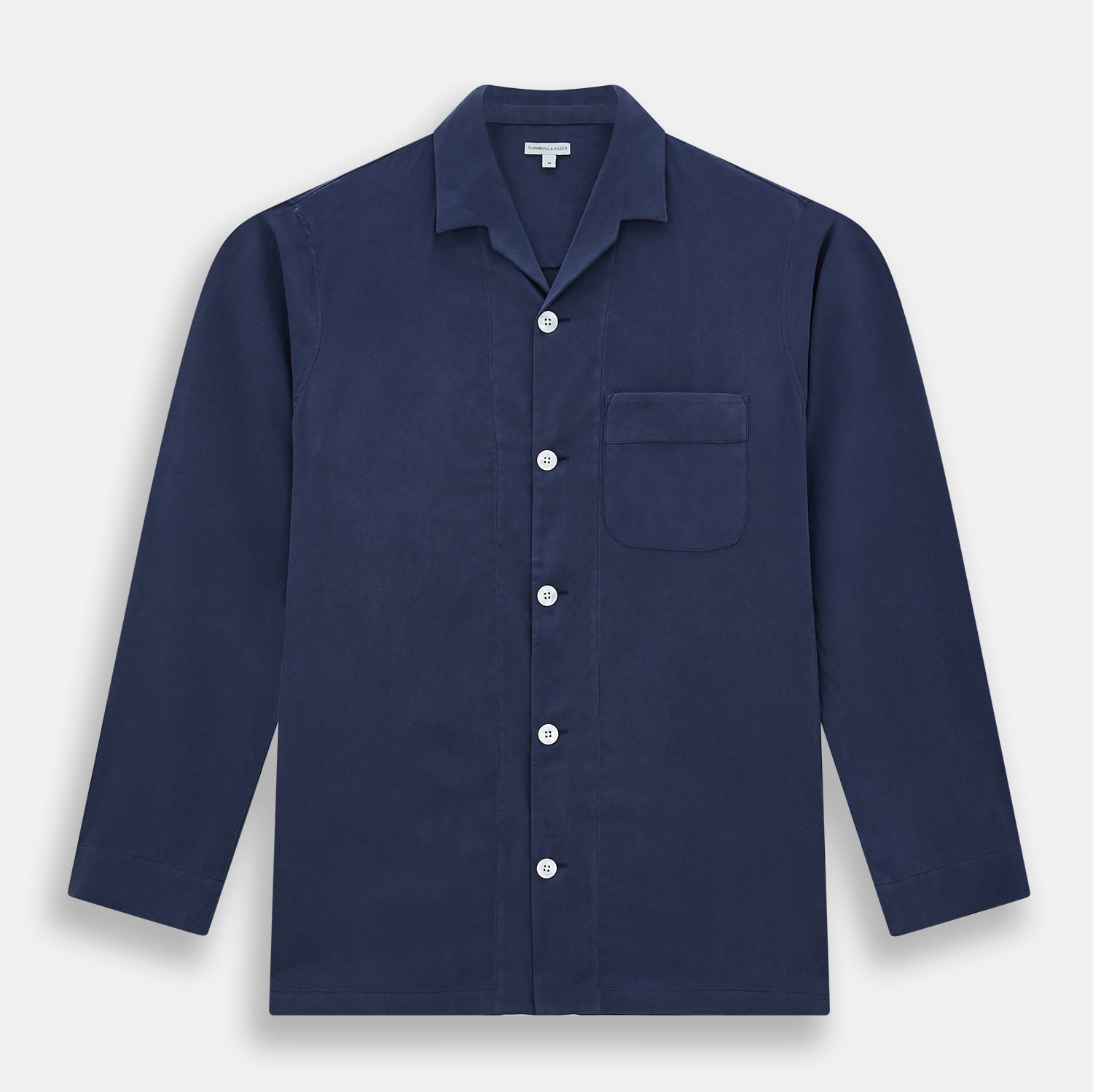 View 4 of product Turnbull & Asser Navy Silk Pyjama Set, laid flat on a white background, includes a long-sleeve button-up shirt with chest pocket and drawstring pants.