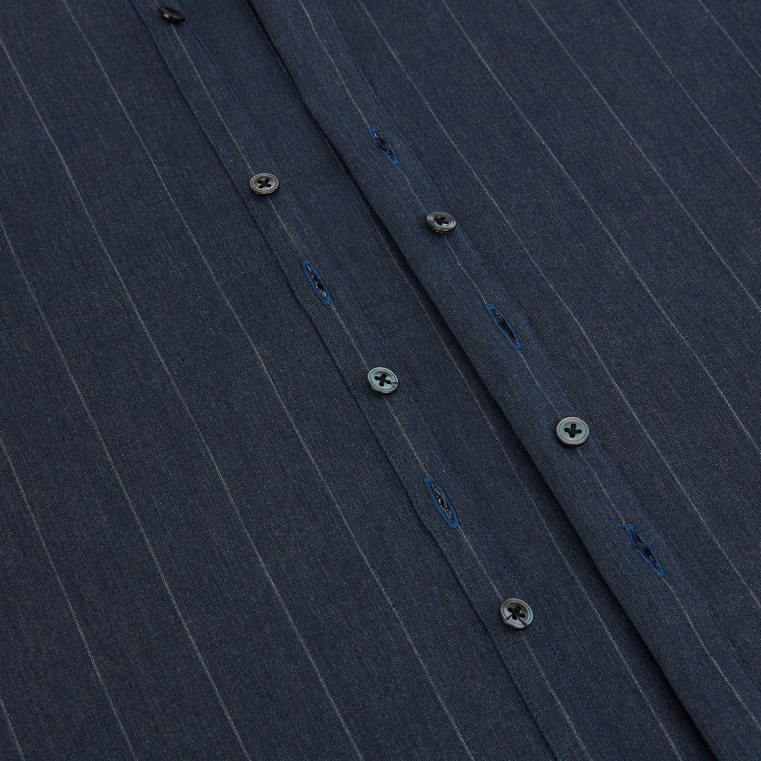 View 7 of product The Turnbull & Asser Navy Melange Wide Stripe Westminster Shirt features a classic collar, buttoned cuffs, and a tailored fit, showcasing British craftsmanship. Laid flat on a white background.