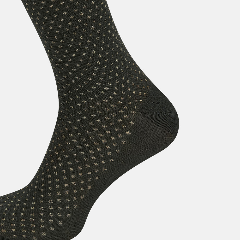 A single Forest Green Motif Long Sock from Turnbull & Asser, crafted from soft mercerised Egyptian cotton, features a subtle pattern, ribbed cuff, and left-foot shaping, displayed on a light background.