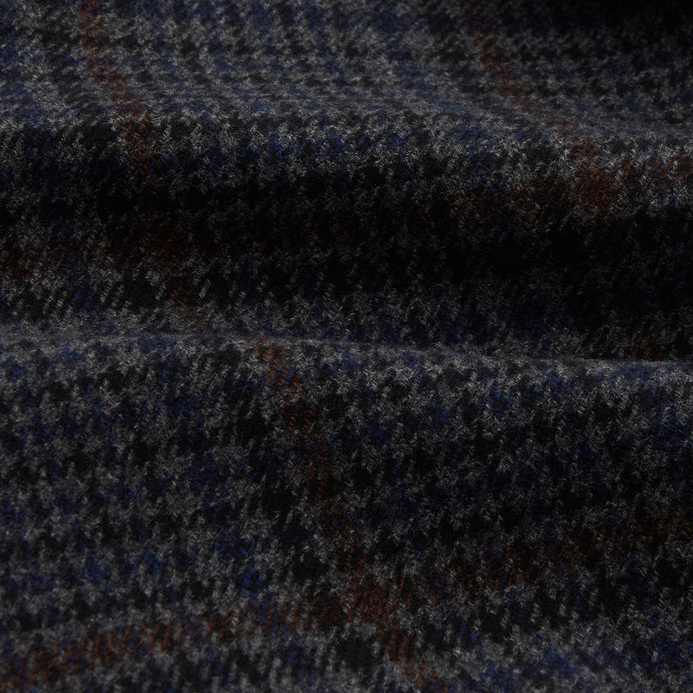The Turnbull & Asser Charcoal Grey Check Wool Pierce Gown features a long, gown-style silhouette with a shawl collar, wrap-around belt, cuffed sleeves, and white edge stitching, shown against a plain white background.