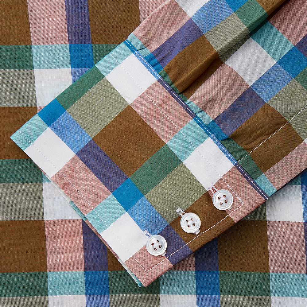 The Turnbull & Asser Green and Pink Multi-check Cotton Blend Regular Fit Mayfair Shirt features a classic T&A collar, white buttons, and an olive green, blue, white, and pink plaid pattern.