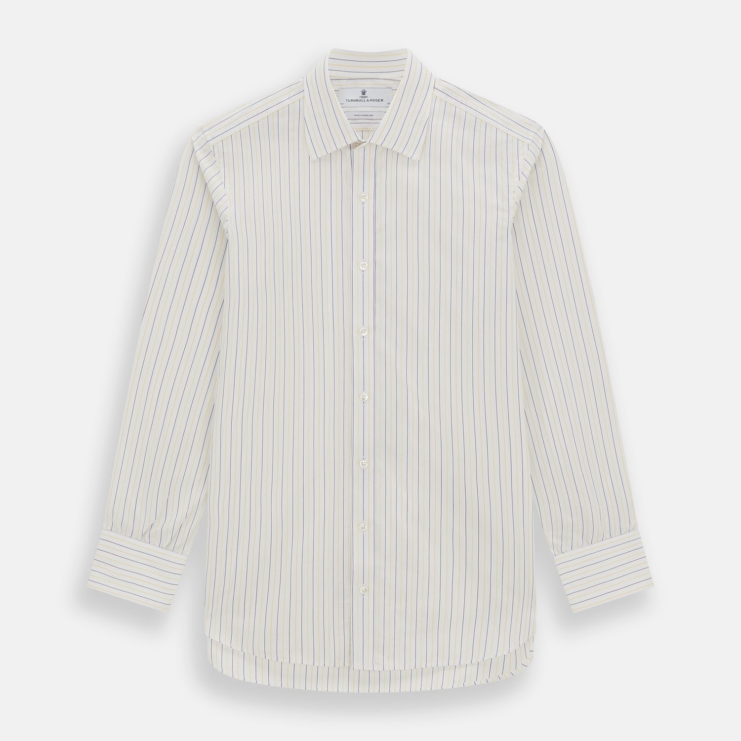 View 1 of product The Turnbull & Asser Yellow Double Pinstripe Mayfair Shirt, a long-sleeved, button-up with thin blue and yellow stripes on white, classic T&A collar, and buttoned cuffs, is laid flat on a white surface.
