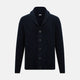 The Turnbull & Asser Midnight Blue Cashmere Shawl Collar Cardigan features ribbed fabric, five black front buttons, a shawl collar, and two front patch pockets, shown against a plain light background.