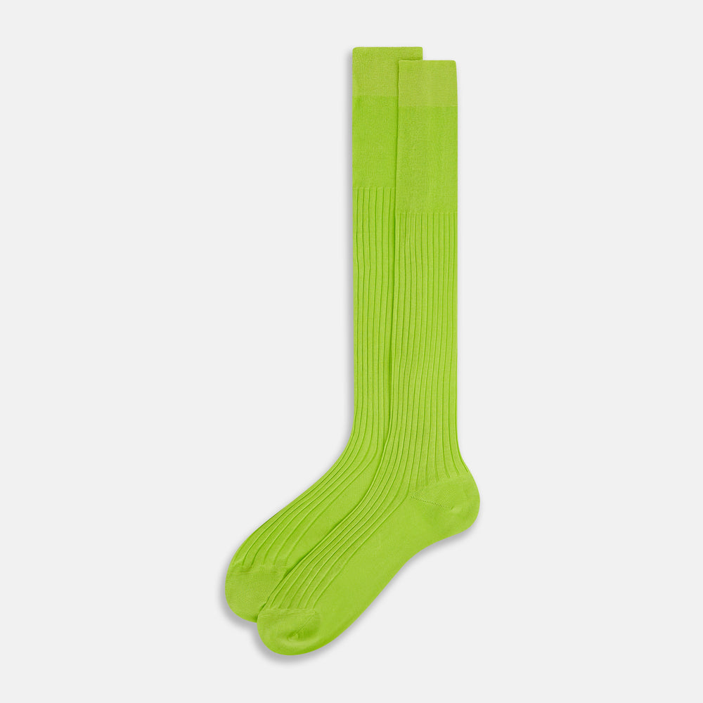 The Turnbull & Asser Lime Long Sock is a single bright green, knee-high sock with a ribbed texture, crafted from soft mercerised cotton, shown against a white background.