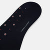 View 3 of product The Turnbull & Asser Midnight Patterned Mid-Length Sock features a ribbed cuff and a design of small white hexagons with red dots, shown here as a single sock on a plain white background.