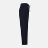 View 4 of product Turnbull & Asser's Light Navy Corduroy Miles Trousers feature a straight-leg stretch fit, elasticated waist, and matching fabric drawstring, shown on a plain white background.