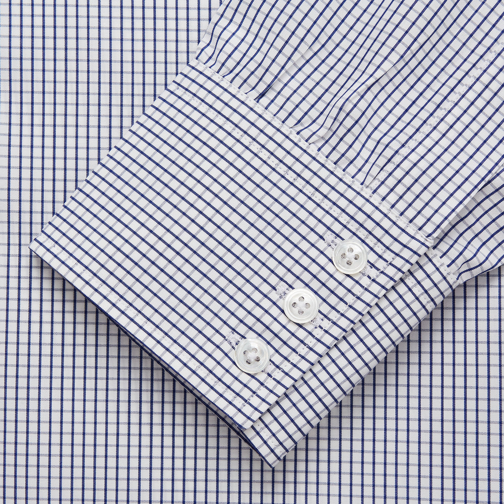 The Navy Check Cotton Regular Fit Mayfair Shirt by Turnbull & Asser features a timeless checked pattern for a classic look.