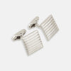 View 1 of product Turnbull & Asser Silver Striped Square Cufflinks feature a ridged, horizontal line design on sterling silver, set against a white background.