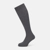 View 1 of product The Ash Long Sock by Turnbull & Asser is a single, knee-high sock in dark gray Egyptian cotton with a ribbed texture, displayed upright against a plain white background.