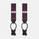 Two Red Jacquard Silk Paisley Braces by Turnbull & Asser, featuring black leather ends and silver-tone buckles, are displayed side by side on a plain white background.