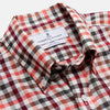 View 2 of product The Turnbull & Asser Red and Green Check Linen Blend Weekend Fit Hayne Shirt features a classic plaid pattern in red, white, black, and green, with a Dorset button-down collar and long sleeves. Displayed on a white background.