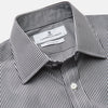 View 2 of product The Turnbull & Asser Black Candy Stripe Cotton Regular Fit Mayfair Shirt features long sleeves, a T&A collar, white buttons, and thin black stripes, displayed on a plain white background.