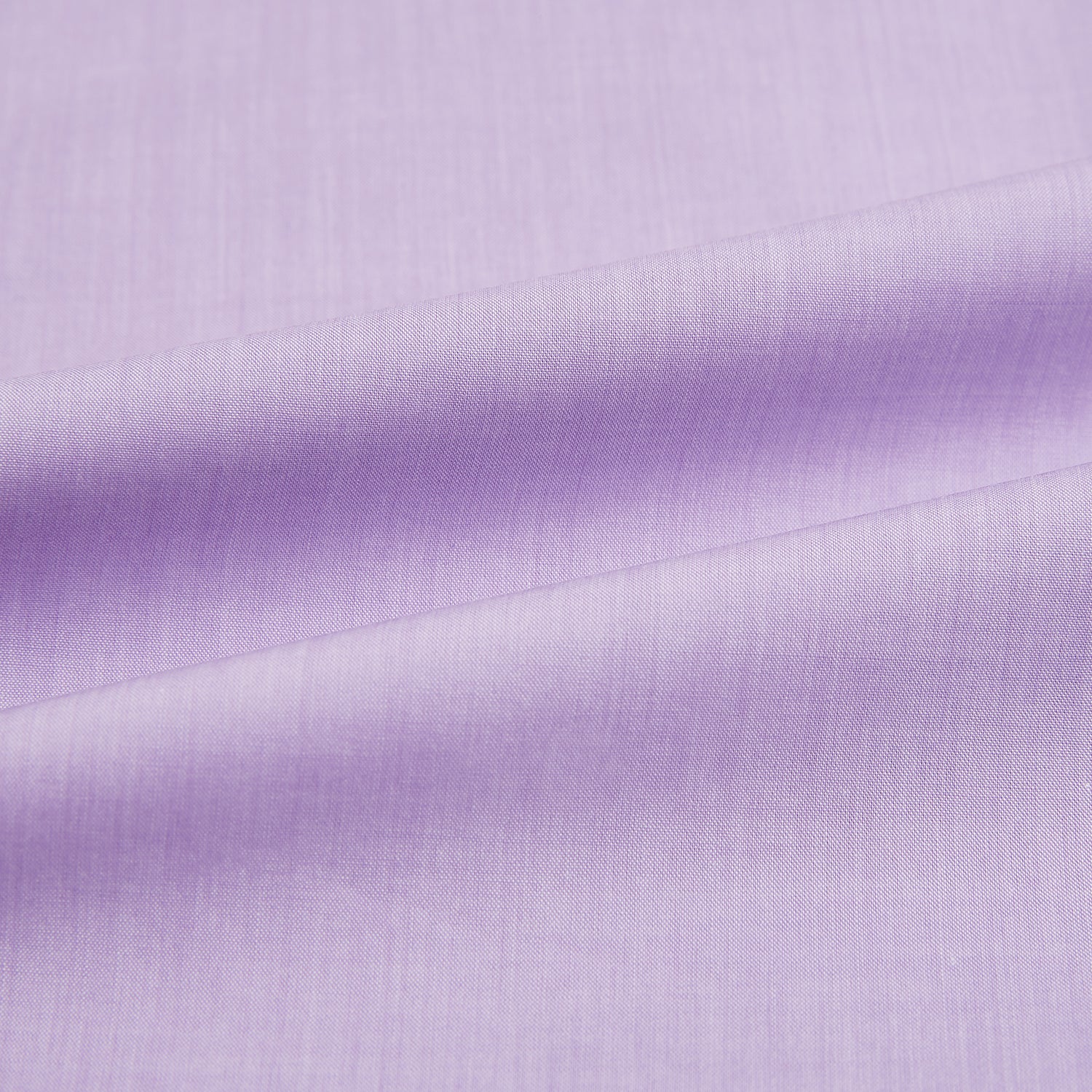 View 6 of product The Turnbull & Asser Purple Pink Mayfair Shirt is a men's formal, long-sleeve button-up with a classic collar and buttoned cuffs, shown in light purple against a plain white background.