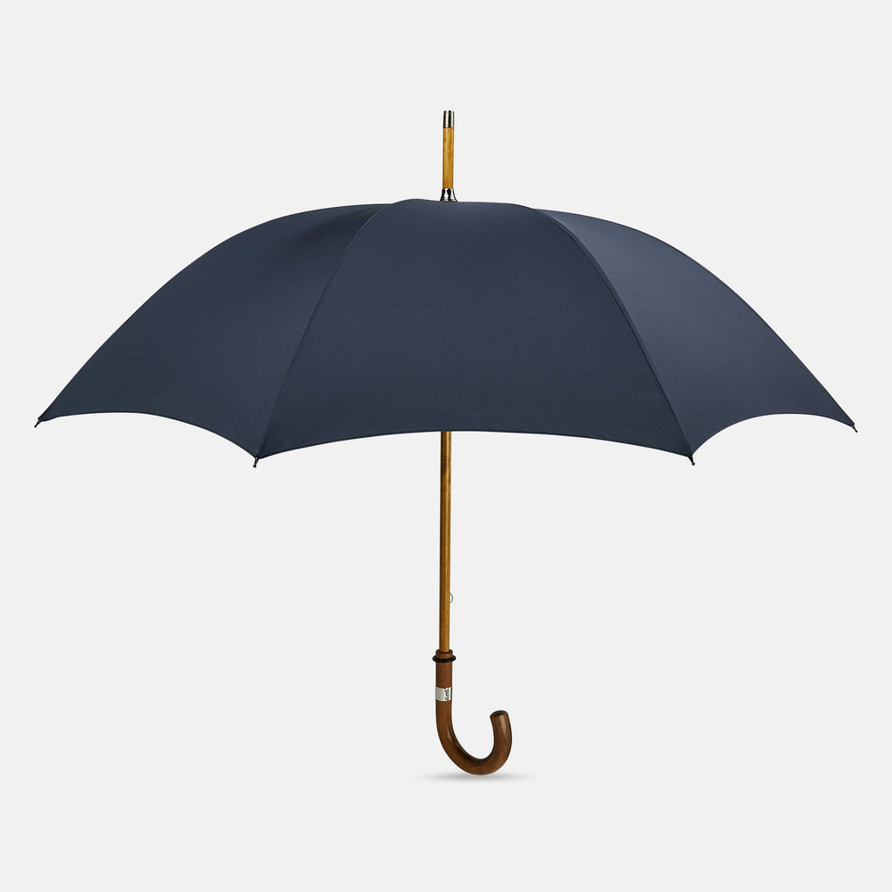 The Turnbull & Asser Navy Traveller Umbrella features a Malacca crook handle and is shown open against a plain white background.