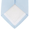 View 4 of product The Turnbull & Asser Plain Woven Satin Silk Tie, in light blue, is neatly rolled and displayed on a plain white background—an essential accessory for refined style.