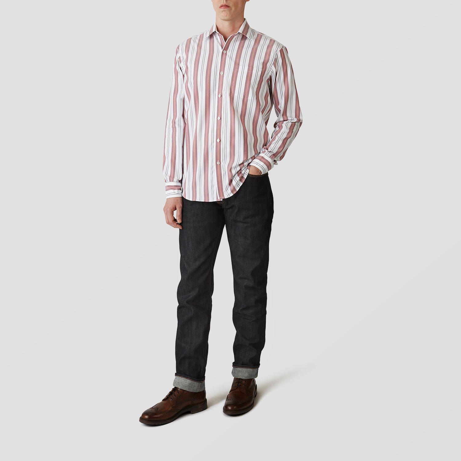 View 2 of product The Turnbull & Asser Red, Blue & White Stripe Weekend Fit Shirt features a Derby collar, 1-button cuffs, and crisp stripes—ideal for stylish winter layering.