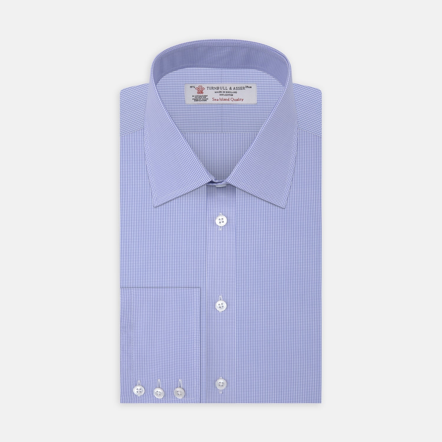 View 1 of product A neatly folded Turnbull & Asser Blue Fine Check Sea Island Quality Cotton Shirt features a T&A collar, 3-button cuffs, subtle micro-check pattern, and white buttons down the front.