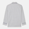 View 6 of product The Turnbull & Asser Blue Multi Check Cotton-Cashmere Modern Pyjama Set features a two-piece design with a long-sleeve button-up top with breast pocket and matching elastic-waist pants in a blue and white check pattern.