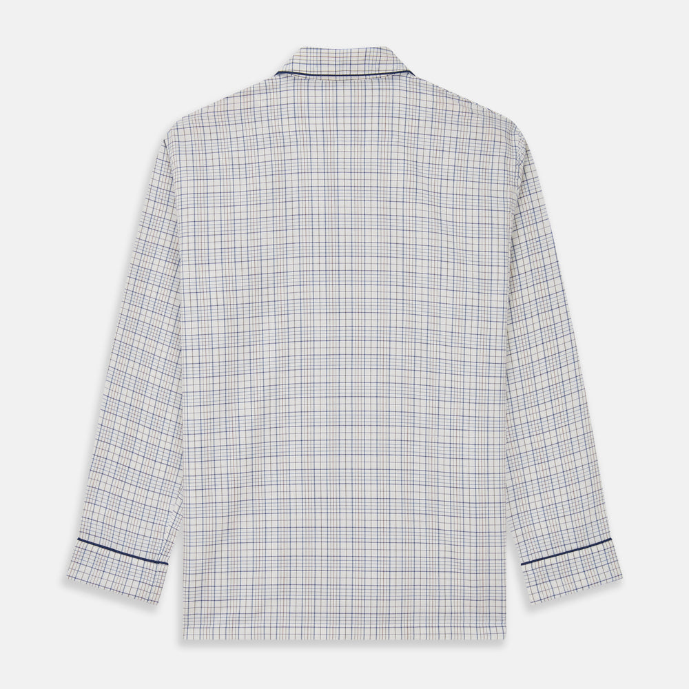 The Turnbull & Asser Blue Multi Check Cotton-Cashmere Modern Pyjama Set features a two-piece design with a long-sleeve button-up top with breast pocket and matching elastic-waist pants in a blue and white check pattern.