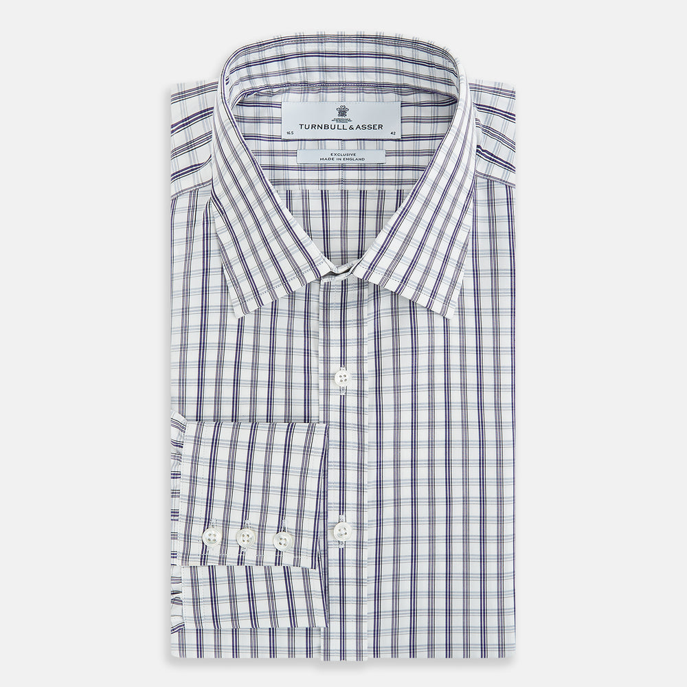 The Turnbull & Asser Purple Multi Check Mayfair Shirt is a long-sleeved, button-up cotton shirt with a collar and purple check pattern, perfect for formal wear and shown against a plain white background.