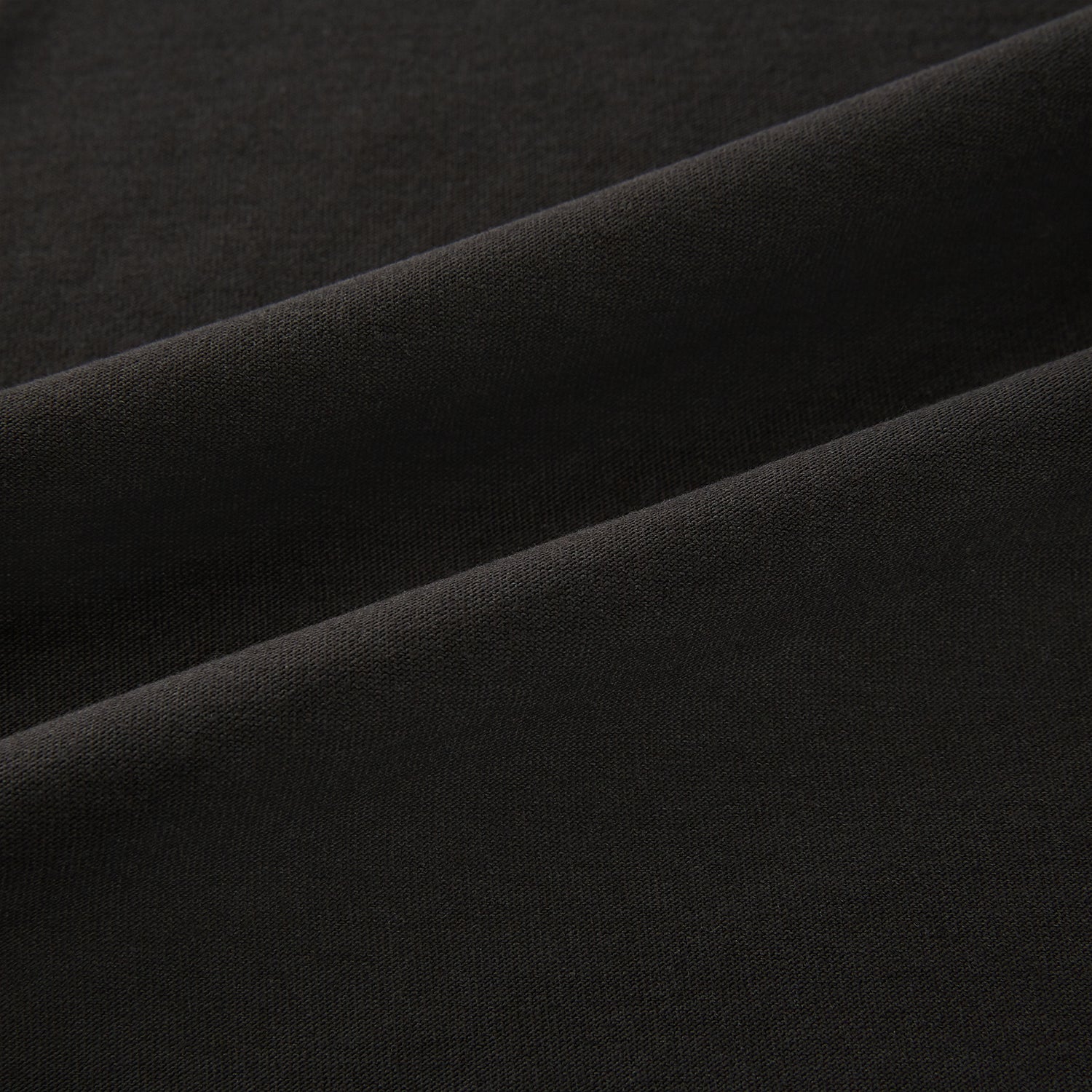 View 6 of product The Dark Chocolate Long-Sleeve T-shirt by Turnbull & Asser, featuring a plain crew neck design with no visible logos, is laid flat on a white background to showcase its quality and versatility.