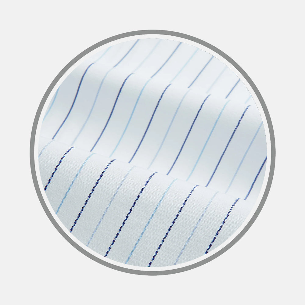 Close-up of Turnbull & Asser's Navy and Blue Wide Pinstripe Fabric, featuring soft white material with evenly spaced blue pinstripes, displayed in a circular frame on a light gray background.