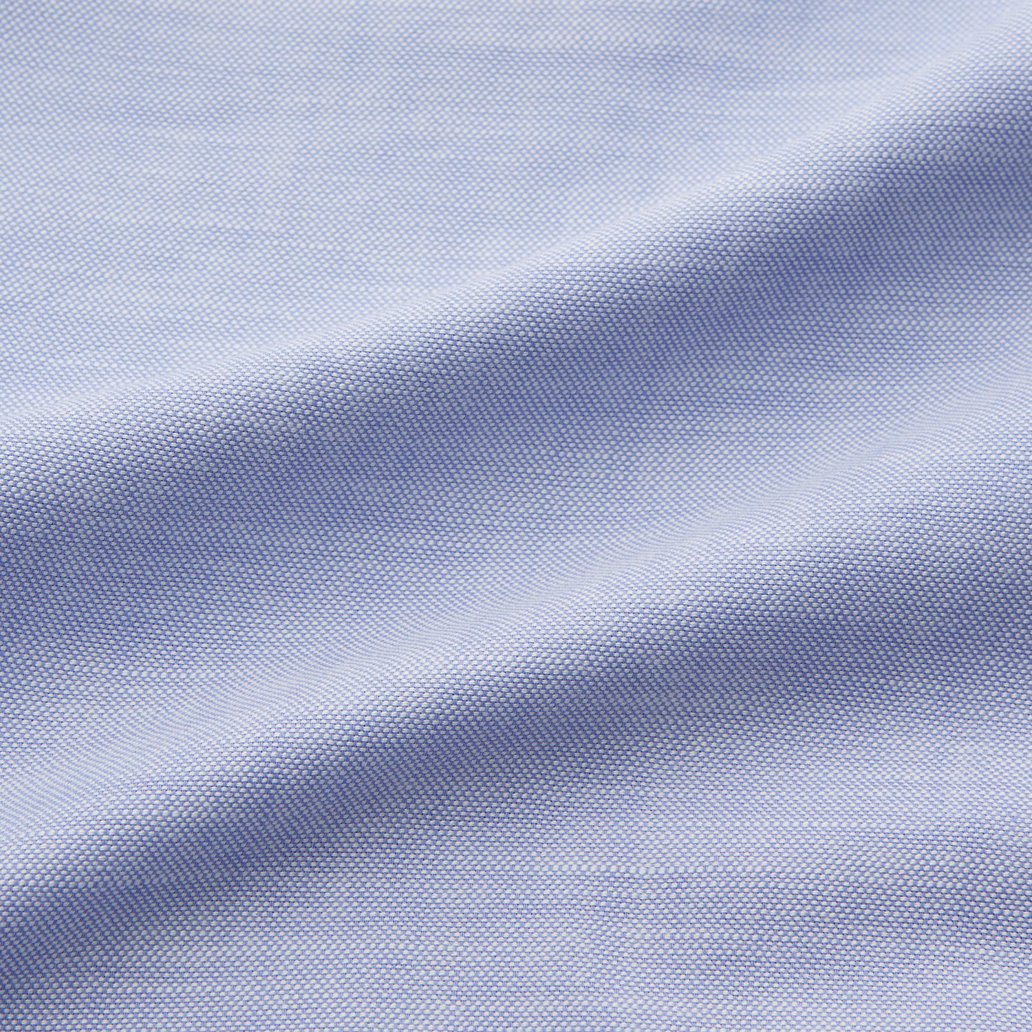 View 5 of product The Turnbull & Asser Pale Blue Weekend Fit Hayne Shirt features a Dorset collar, white buttons, and 1-button cuffs. This casual, long-sleeve button-down is displayed laid flat on a white background.