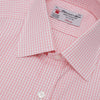 View 5 of product The Turnbull & Asser Light Pink Gingham Check Shirt features a classic T&A collar, 3-button cuffs, and white buttons, neatly folded on a plain white background.