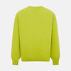 View 3 of product The Turnbull & Asser Lemon Green Cashmere Round Neck Jumper features long sleeves with ribbed cuffs and hem, displayed on a white background.