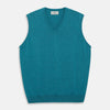 View 1 of product The Teal Ifor Slipover by Turnbull & Asser is a sleeveless, V-neck knit made in Scotland from lightweight cashmere, shown in teal blue against a white background.