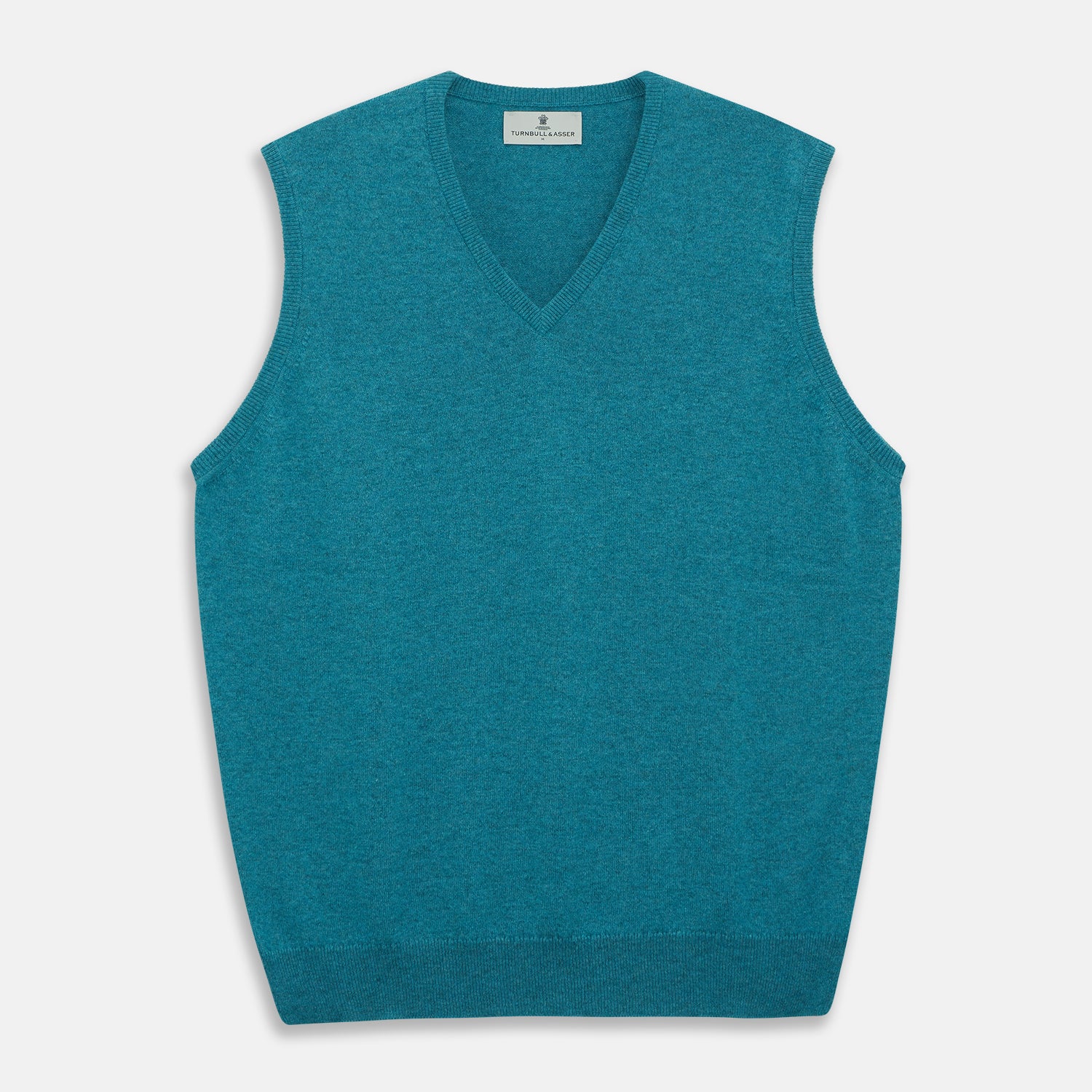View 1 of product The Teal Ifor Slipover by Turnbull & Asser is a sleeveless, V-neck knit made in Scotland from lightweight cashmere, shown in teal blue against a white background.
