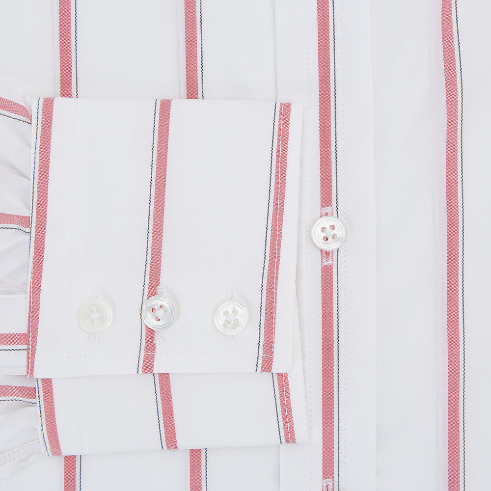 The Turnbull & Asser Coral Track Stripe Mayfair Shirt features a white Italian cotton fabric with vertical red stripes and a pointed T&A collar, shown against a plain light background.