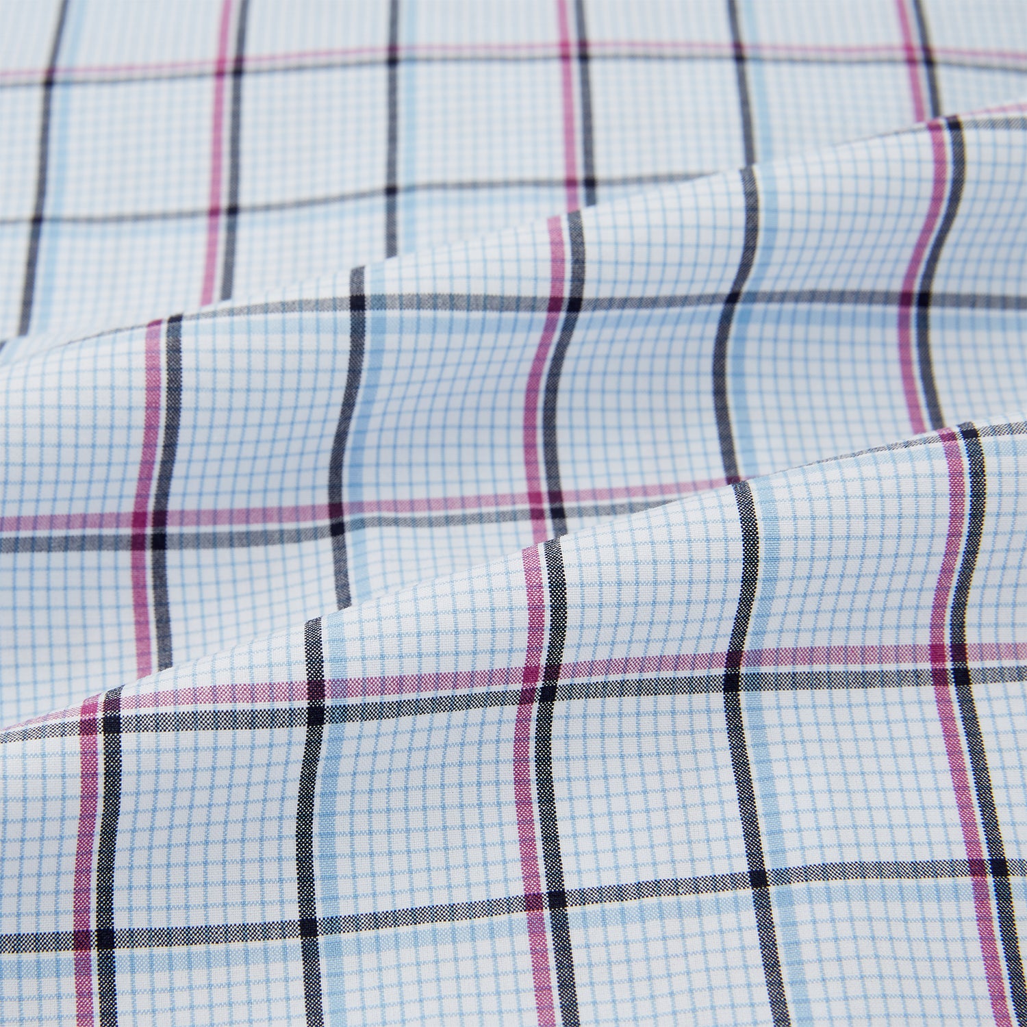 View 6 of product The Turnbull & Asser Burgundy and Blue Check Pyjama Shirt features a classic collar, button-up front, and grid check pattern—an elegant choice for nightwear or comfortable sleepwear.