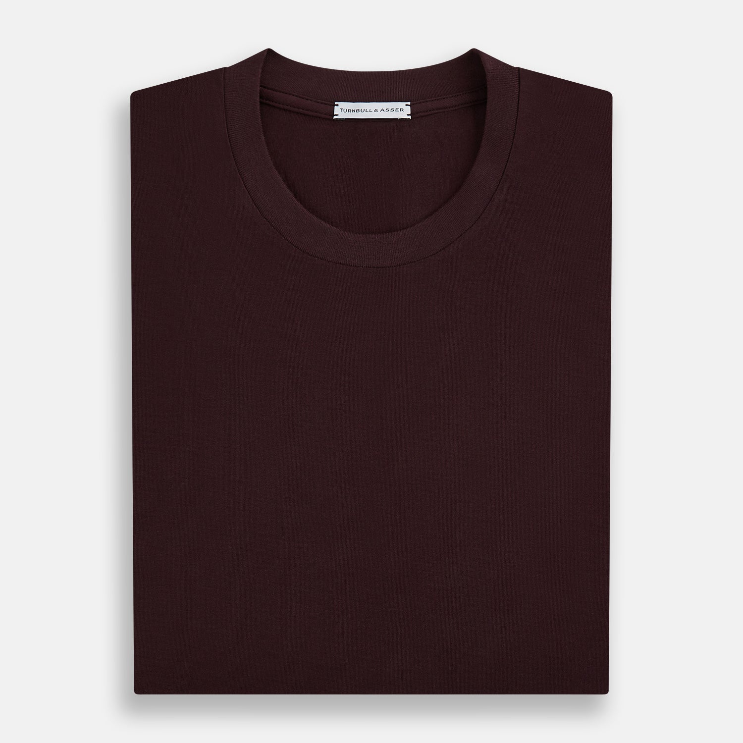 View 5 of product The Turnbull & Asser Burgundy Short-Sleeve T-shirt, featuring a crew neckline and clean design with no visible logos, is shown against a white background for a timeless and versatile look.